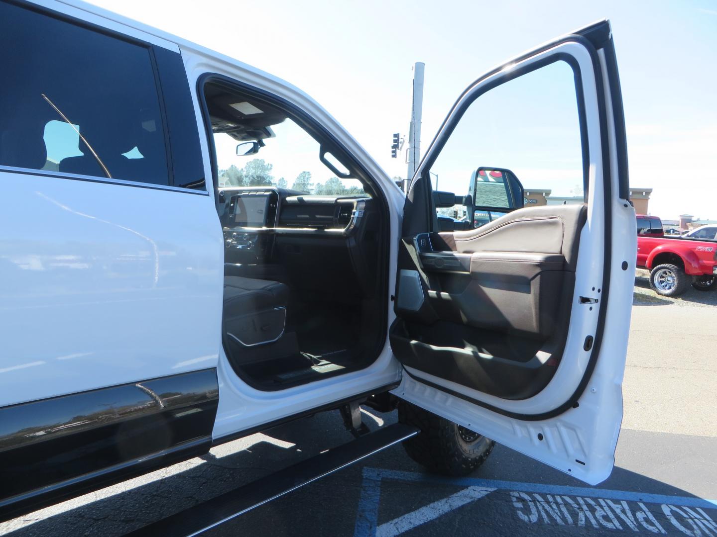 2024 White /BROWN Ford F-250 SD King Ranch Crew Cab 4WD (1FT8W2BM0RE) with an 6.7 HI OUTPUT POWER STROKE engine, 10-SPEED AUTO TORQSHIFT transmission, located at 2630 Grass Valley Highway, Auburn, CA, 95603, (530) 508-5100, 38.937893, -121.095482 - New 24 King Ranch featuring a BDS 3" radius arm suspension system, Fox 2.5 Performance Elite series shocks, Fox ATS steering stabilizer, 37" Nitto Ridge Grappler tires, 18" Method MR315 wheels, 2wd front bumper valance, B&W Tow and Stow hitch, and a Bolt Lock. - Photo#54